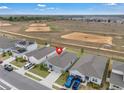 An aerial view of single Gathering homes, with well manicured lawns in a suburban neighborhood at 4905 Vellacito Way, Davenport, FL 33897