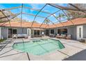 Inviting screened-in pool with ample deck space, ideal for outdoor entertaining and relaxation at 5045 Maui Cir # 12, Orlando, FL 32808