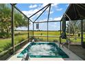 Outdoor hot tub with a beautiful view of the adjacent golf course at 685 Winifred Way, The Villages, FL 32162