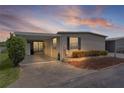 Inviting single-story home with carport, perfect for relaxed living and ease at 25 Captains Pt, Fruitland Park, FL 34731