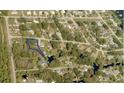 Aerial view of property with outlined borders in a neighborhood at 33710 Linda Ln, Leesburg, FL 34748