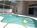 Inviting pool with a spacious sun deck, perfect for outdoor entertaining and relaxation at 223 Lady Diana Dr, Davenport, FL 33837