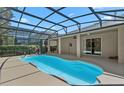 A beautiful screened-in pool offers a private and refreshing outdoor retreat at 5138 Rishley Run Way, Mount Dora, FL 32757