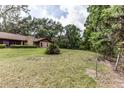 Expansive backyard, providing plenty of room for outdoor activities and enjoying nature at 12196 Ne 4Th Pl, Oxford, FL 34484