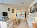 Bright and airy living room with vaulted ceilings and an open floor plan at 156 Ridgebrook Ct, Davenport, FL 33896