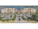 Luxury lakeside condos with ample parking and manicured grounds at 16300 County Road 455 # 511, Montverde, FL 34756