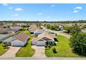 Gorgeous home in a quiet residential neighborhood, with well-manicured lawns and mature landscaping at 2104 Iveywood St, The Villages, FL 32163