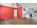 Bright open living room featuring wood-look floors and modern updates at 706 Michigan St, Mount Dora, FL 32757