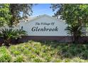The Village of Glenbrook community entrance sign with lush landscaping at 3049 Saint Thomas Ln, The Villages, FL 32162