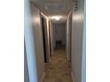 Hallway with multiple doors and tile floors at 4294 Nimons St, Orlando, FL 32811