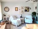 Bright living room with a neutral color scheme and comfortable seating at 11250 Sw 78Th Ct, Ocala, FL 34476