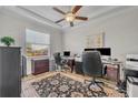 Comfortable office space with a ceiling fan, and bright window at 4060 Longbow Dr, Clermont, FL 34711