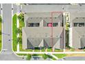Aerial view showcases the townhome's location, backyard, and proximity to neighboring properties at 644 Orange Belt Loop, Winter Garden, FL 34787