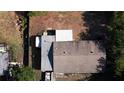 An aerial view showcasing the layout and roof of the property at 5029 Eagles Nest Rd, Fruitland Park, FL 34731