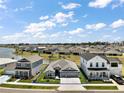Lovely single-Gathering home in a scenic neighborhood with a pond and well-maintained lawns at 7669 Chastain Cir, Middleton, FL 34762