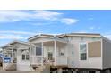 New manufactured home with unfinished exterior features a covered front porch and white trim at 2270 Griffin Rd, Bartow, FL 33830