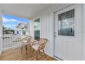 Cozy front porch with seating, offering a charming spot to enjoy the outdoors and welcome guests at 811 N Swindell #2 Ave, Lakeland, FL 33810