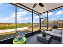 Enjoyable screened patio with views of private backyard and surrounding area at 1017 Bluegrass Dr, Groveland, FL 34736