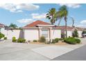 Well-maintained home showcasing manicured landscaping and inviting outdoor spaces, ideal for relaxation at 732 Ramirez Ave, The Villages, FL 32159