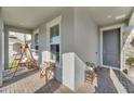 Inviting front porch features a porch swing and ample space for outdoor relaxation at 8272 Procida Isle Ln, Windermere, FL 34786