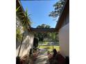 Charming front entrance with landscaped pathway at 879 Little Bend Rd, Altamonte Springs, FL 32714