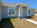 Attractive single-Gathering home with a well-manicured lawn and inviting front entrance at 15010 Sw 29Th Ave Road, Ocala, FL 34473