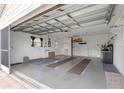 Spacious two-car garage with storage and lots of room at 17587 Se 95Th Cir, Summerfield, FL 34491