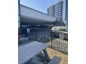 Designated covered parking area near the building entrance for convenient access and weather protection at 1909 S Atlantic Ave # 311312, Daytona Beach, FL 32118