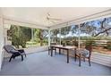 Relaxing screened lanai showcasing picturesque views of the outdoors at 8097 Se 174Th Belhaven Loop, The Villages, FL 32162