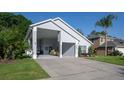 Home featuring a spacious covered carport with ample space for parking and storage at 2539 Caithness Way, Clermont, FL 34714