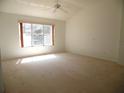 Spacious main bedroom bathed in sunlight from a large window at 739 Cortez Ave, The Villages, FL 32159