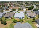 Wide aerial shot of the home and neighborhood showcasing the community at 951 Chapman Loop, The Villages, FL 32162