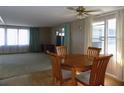 Dining room with wood floors and bright windows at 323 Hawthorne Blvd, Leesburg, FL 34748