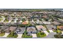 Sprawling community with lush landscaping and a bird's-eye view of a beautiful, quiet neighborhood at 3537 Cluster Ct, The Villages, FL 32163