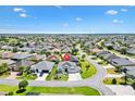 An aerial view showcases the home's location within a sprawling residential community at 1182 Allaire Loop, The Villages, FL 32163