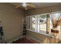 Bright, airy sunroom with abundant natural light, neutral decor and lots of space at 2039 Thurmond Ave, The Villages, FL 32162