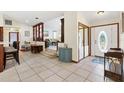Inviting entryway with tile flooring, decorative accents, and an open view into the spacious living area at 307 Water Shore Dr, Leesburg, FL 34748