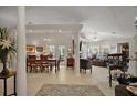 Open-concept living area showcasing tile floors, living, dining, and Gathering room with lots of natural light at 35350 County Road 439, Eustis, FL 32726
