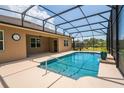 Relaxing screened-in swimming pool with a covered lanai, perfect for outdoor entertaining at 3733 Statham Dr, Apopka, FL 32712