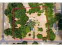 Aerial view outlining the property boundaries of a house surrounded by lush trees at 43411 State Road 19, Altoona, FL 32702
