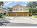 Three-story townhome features a private balcony and three car garage at 866 Ashworth Overlook Dr # B, Apopka, FL 32712