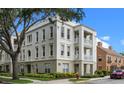 Exterior view of a multi-story condo building featuring classic architectural details and landscaped grounds at 1021 Siena Park Blvd # 204, Kissimmee, FL 34747