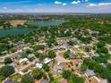 Aerial view of the community surrounding the home near a lake at 111 Ridgeview Cir, Eustis, FL 32726