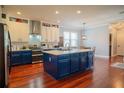 Spacious kitchen featuring an island, modern appliances, and ample cabinetry at 14832 Royal Poinciana Dr, Orlando, FL 32828