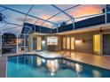A covered pool area with tile flooring, a water view to the kitchen bar, and an open backyard at 4879 Brightmour Cir, Orlando, FL 32837