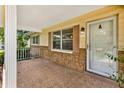 Charming front porch featuring decorative brick and a welcoming entrance at 8709 Sw 96Th St # A, Ocala, FL 34481