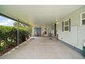 Spacious carport provides ample parking and storage at 5300 Tigers Tail, Leesburg, FL 34748