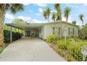 Charming home with a spacious carport area at 5300 Tigers Tail, Leesburg, FL 34748