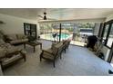 Relaxing outdoor living area overlooking a refreshing private pool and lush backyard at 2227 S Spring Garden Ave, Deland, FL 32720