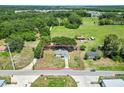Aerial view of property with lush green surroundings and clearly marked property lines at 2845 County Road 523, Wildwood, FL 34785